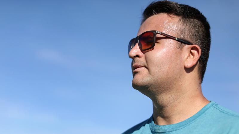 Close shot of refugee Para athlete Shahrad Nasajpour's face wearing sunglasses