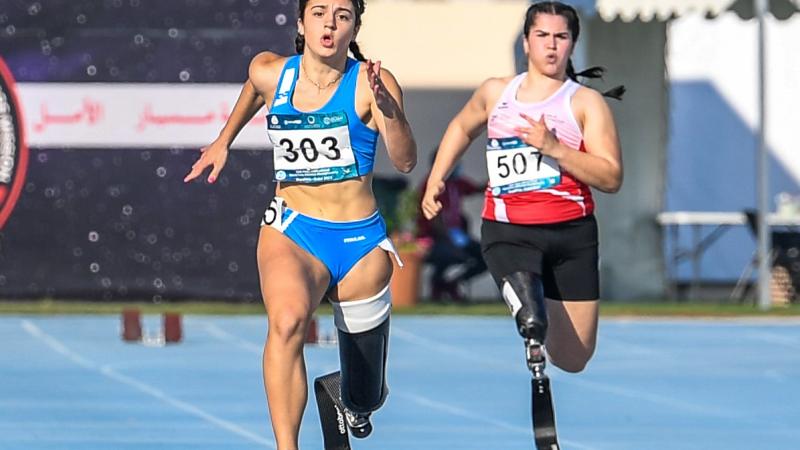 Italy’s Ambra Sabatini (L) en route to gold at Dubai 2021 Grand Prix.