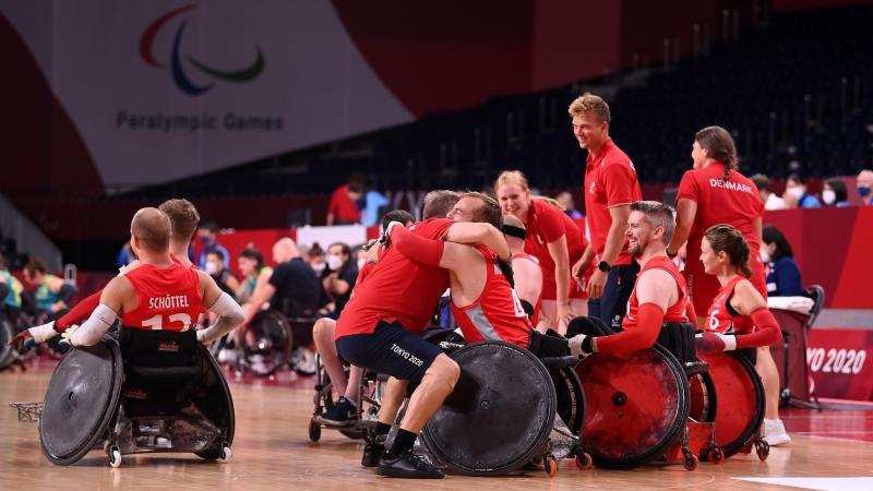 Danish wheelchair rugby team celebrating after beating powerhouses Australia