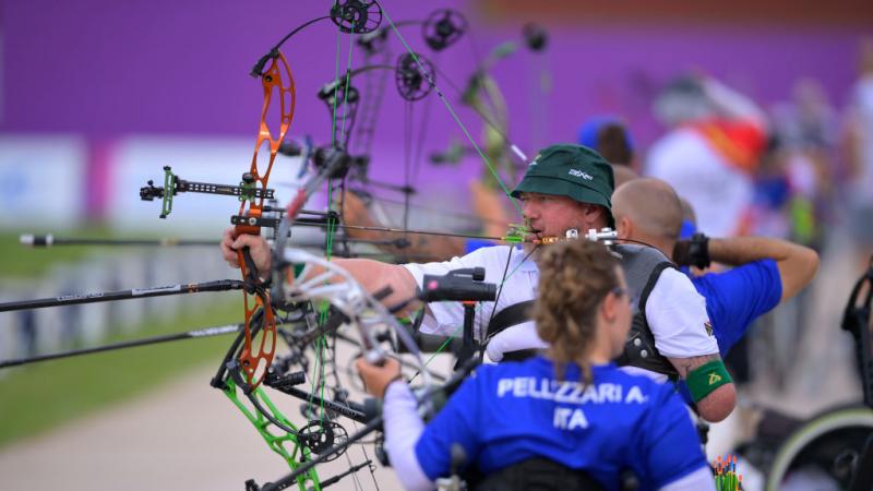 Row of archers in training