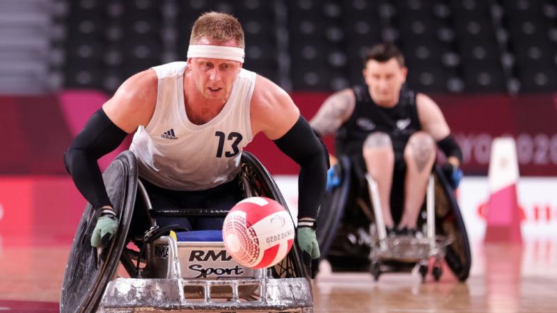 Phipps close up chasing the ball in his wheelchair