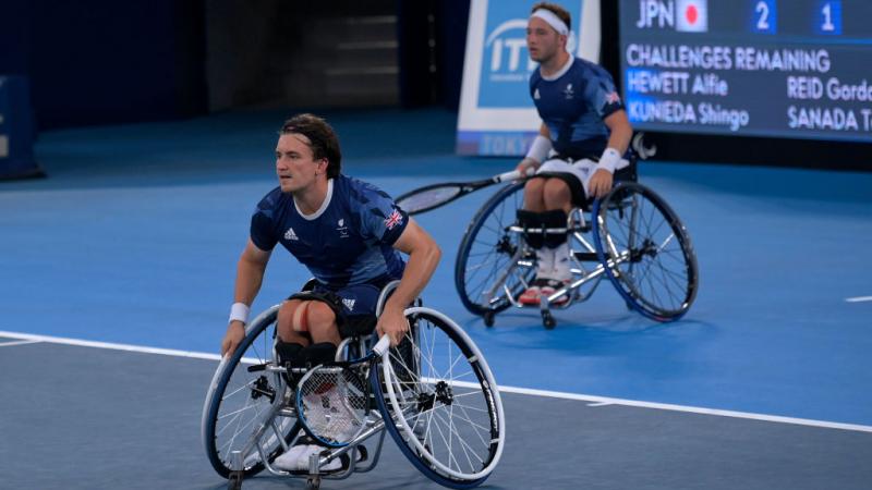 Gordon Reid in action with Alfie Hewett just behind him