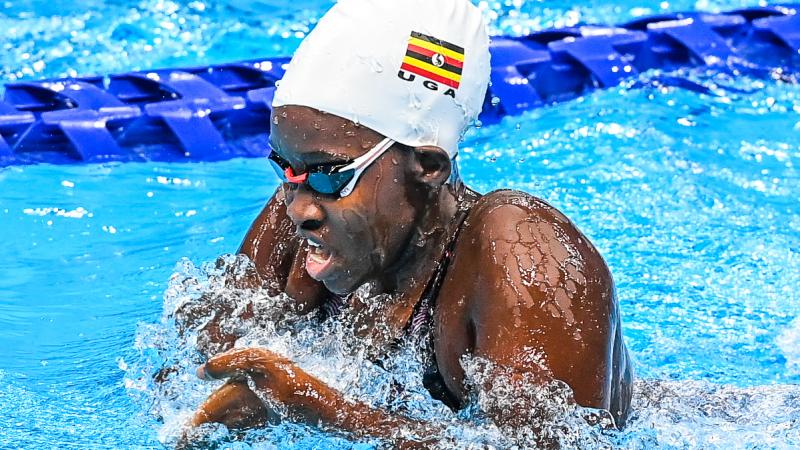 Husnah Kukundakwe in action at the Tokyo 2020 Aquatics Centre