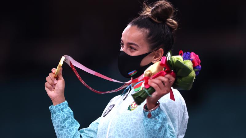 Sevda Valiyeva of Azerbaijan celebrates her gold medal on the podium