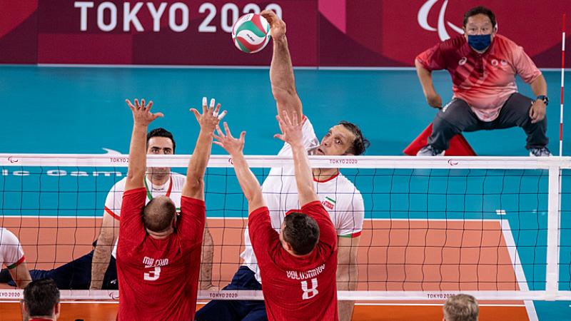 Iran's Morteza Mehrzadselakjani spikes the ball in a sitting volleyball game