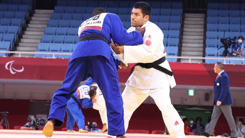 Peruvian judoka Fred Villalobos Corrales in action at Tokyo 2020 against Cuban opponent