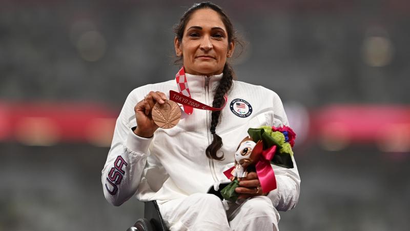 Cheri Madsen shows medal