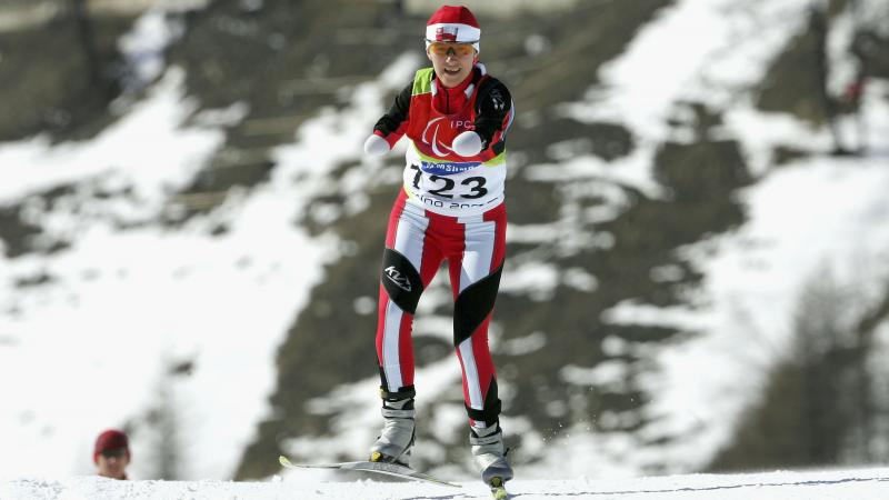 Polish Katarzyna Rogowiec smiles during the cross-country competition at Torino 2006