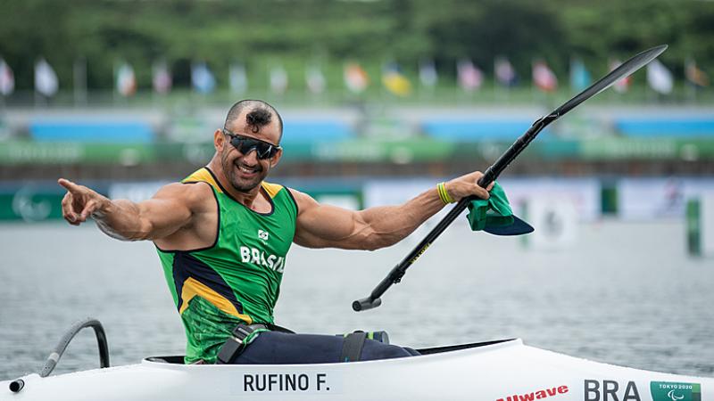 Male canoe athlete celebrates