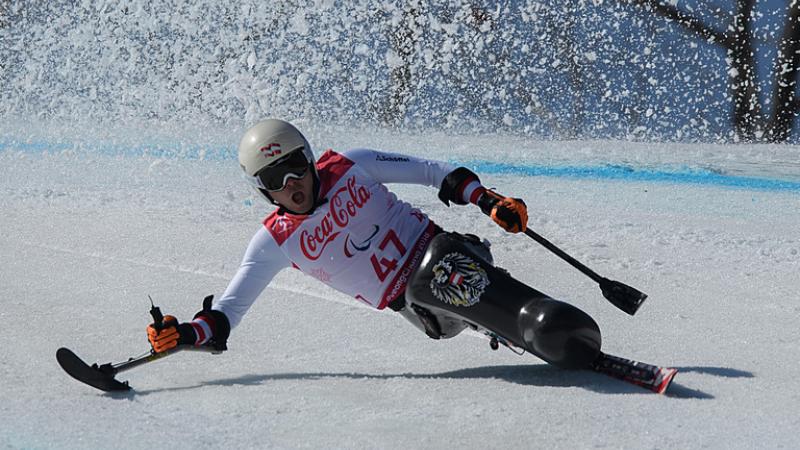 A male sit-skier competing at the PyeongChang 2018 Paralympic Winter Games