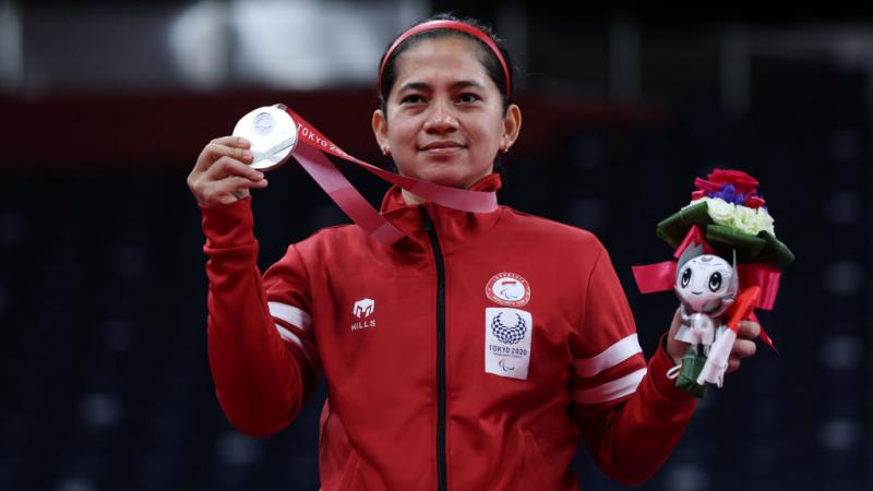 Leani Ratri Oktila of Indonesia wins a silver in the Badminton Women's Singles SL4 at the Tokyo 2020 Paralympic Games.