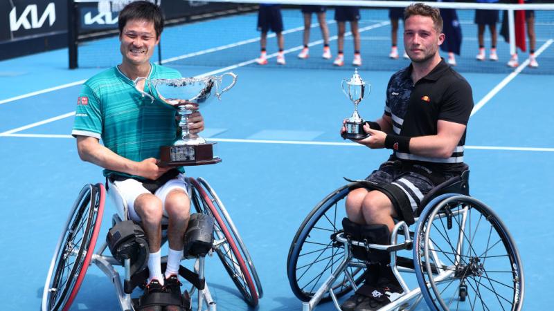 Shingo Kunieda of Japan and Alfie Hewett of Great Britain pose during the trophy presentation of the Men's Wheelchair Singles final. 