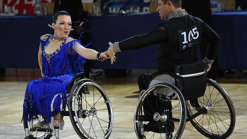 A couple of wheelchair dancers in a Para dance sport competition