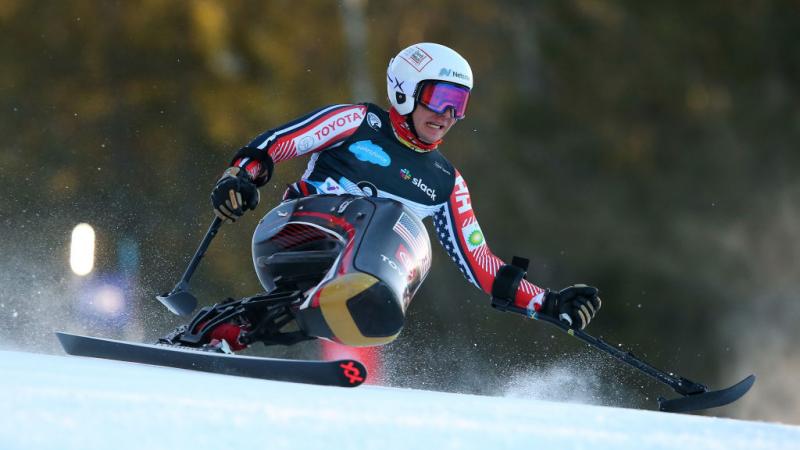 A male sit skier in a Para alpine skiing competition