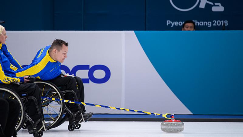 Ronny Person of Sweden in action during the PyeongChang 2018 wheelchair curling competition