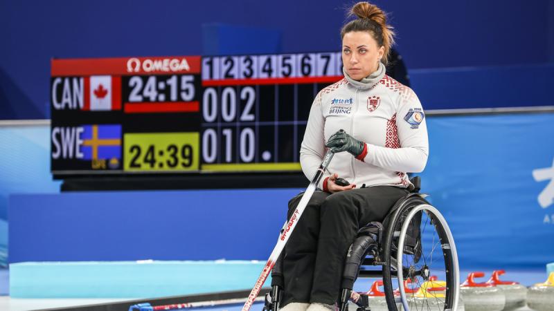 Latvia's wheelchair curler Polina Rozkova in action