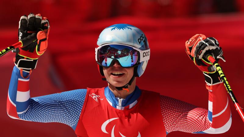 Arthur Bauchet smiles after his downhill victory