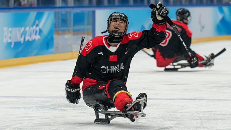 Chinese Para Ice Hockey player Cui Yutao celebrates after the victory against the Czech Republic