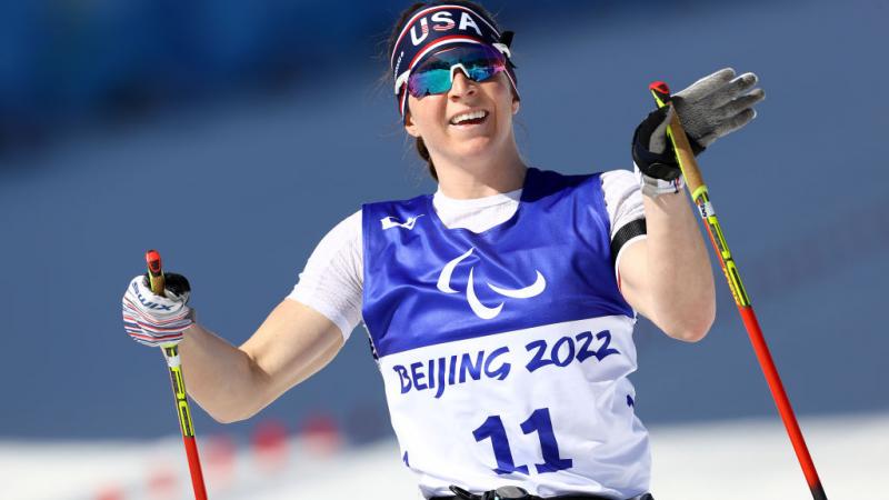 GOLDEN RUN: Kendall Gretsch of United States reacts after winning the Para Biathlon Women's Middle Distance Sitting at the Beijing 2022 Winter Paralympics.  