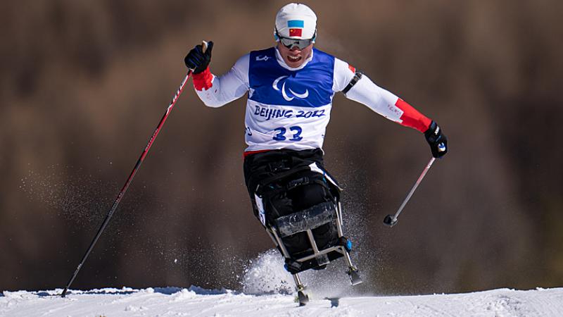 Liu Mengtao of China competes in the men’s Sprint Sitting Para Biathlon in Beijing 2022 Winter Paralympic Games at the Zhangjiakou National Biathlon Centre.