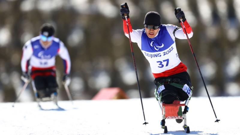 Zixu Liu of China competes in the men's sprint sitting Para Biathlon in the Beijing 2022 Paralympic Winter Games at Zhangjiakou National Biathlon Centre.