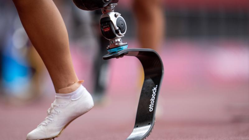 The foot and blade of an athlete in the Olympic Stadium track at the Tokyo 2020 Paralympic Games.