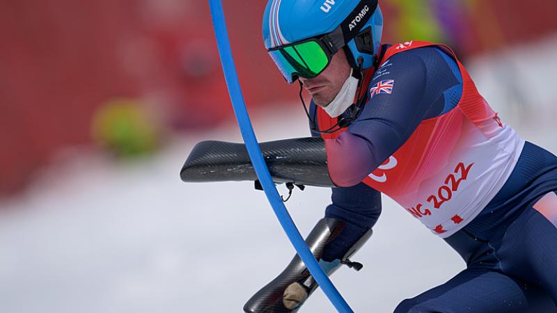 James Whitley wearing Great Britain's uniform competing in the Beijing slalom course