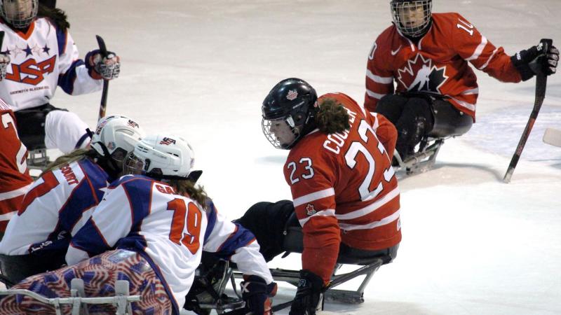 USA and Canadian players clash during a gold medal match in the second Women’s International Para Ice Hockey Cup held in Ostrava, Czech Republic.