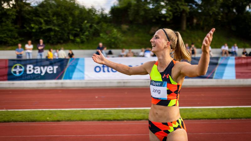 Image of a female Para Athletics athlete happy after her competition