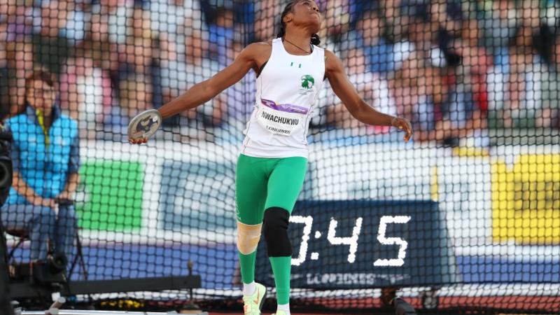 A female discus thrower during an athletics field event