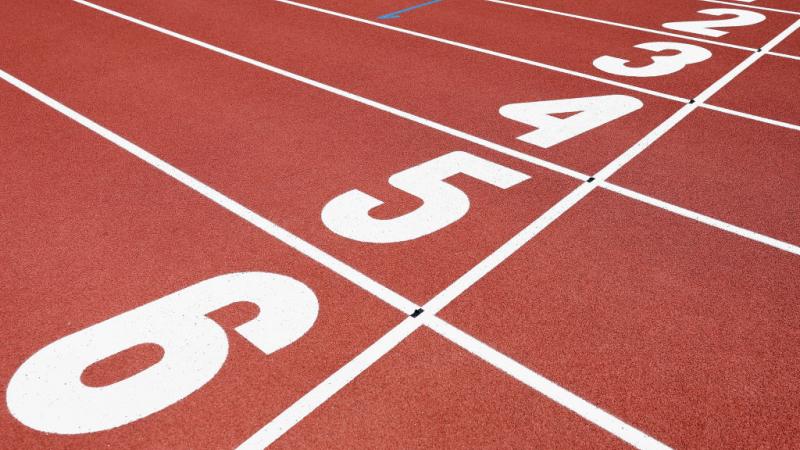 A red athletics track finishing line