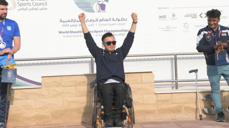  South Korea's Kim Jungnam celebrates at the podium, after his win in P3 - mixed 25m pistol SH1 final in Al Ain.