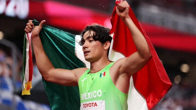 Mexico's Jose Rodolfo Chessani Garcia celebrates his Paralympic gold medal at Tokyo 2020 in the men’s 400m T38.