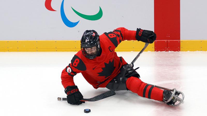  Tyler McGregor of Team Canada controls the puck 