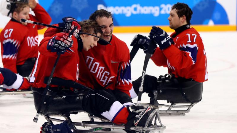 A group of Norwegian Para ice hockey players on ice