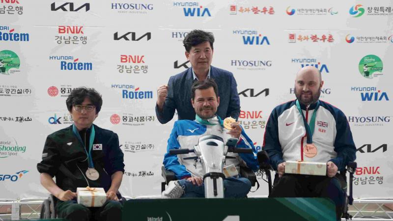 Tanguy De La Forest (centre), the reigning double world champion, continued his amazing run of form from last year's Al Ain 2022 World Championships to clinch three gold and a world record with his effort of 254.7 in R4 - mixed 10m air rifle standing SH2. 