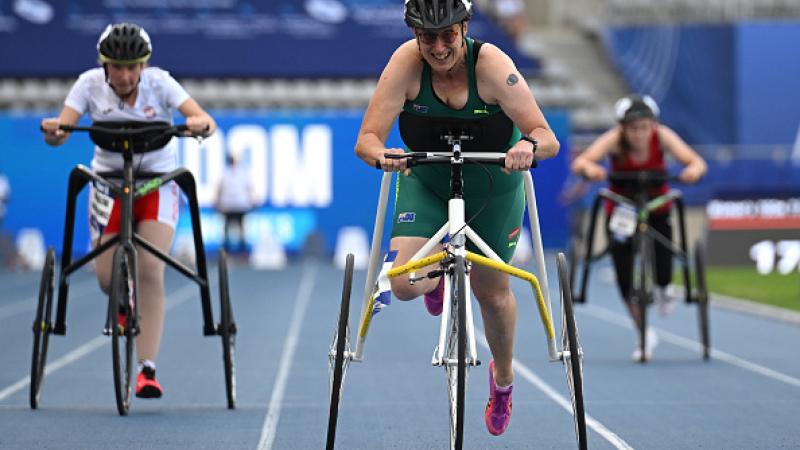 A female frame runner ahead of two competitors