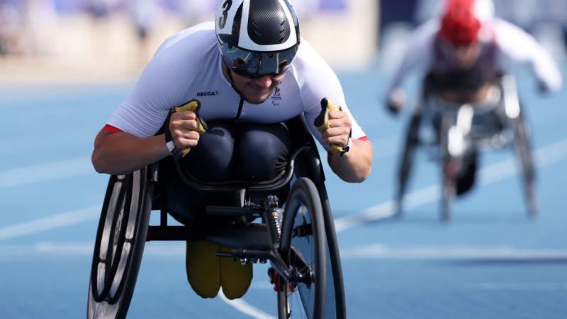 A male wheelchair racer in a Para athletics competition