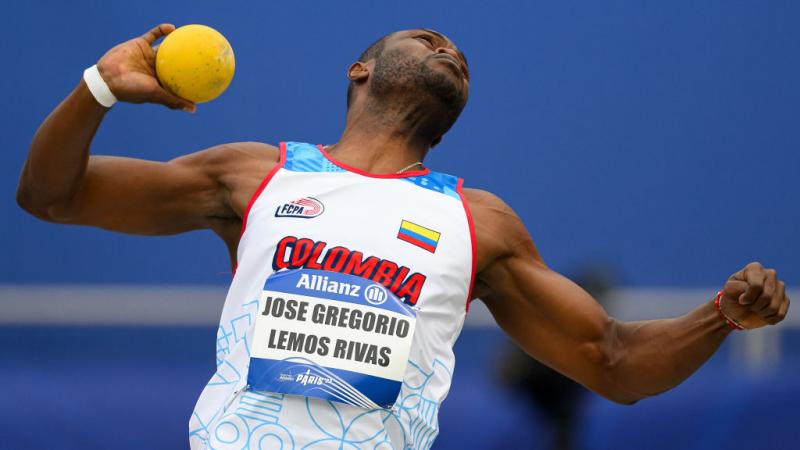 A man throwing in a shot put competition