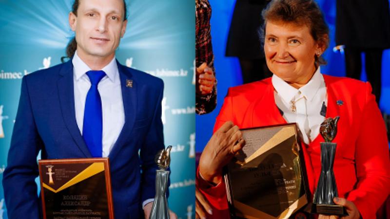 A man and a woman in a wheelchair holding trophies