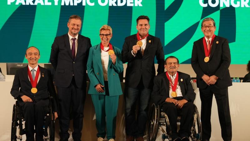 From left to right, President of NPC Korea Jin-owan Jung; IPC President Andrew Parsons; former IPC Governing Board member Rita van Driel; Rising Phoenix producer Greg Nugent; former President of NPC El Salvador Jorge Ochoa; and former IPC Governing Board member Yasushi Yamawaki