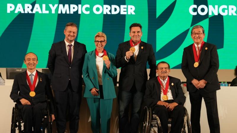 From left to right, President of NPC Korea Jin-owan Jung; IPC President Andrew Parsons; former IPC Governing Board member Rita van Driel; Rising Phoenix producer Greg Nugent; former President of NPC El Salvador Jorge Ochoa; and former IPC Governing Board member Yasushi Yamawaki