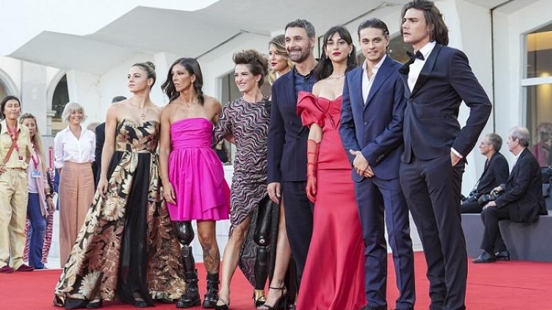 Italian Paralympians pose during the Red Carpet of the Venice Film Festival with the cast of Fantastici 5