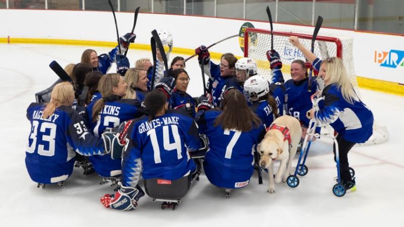 Team USA celebrate after retaining their title beating Canada