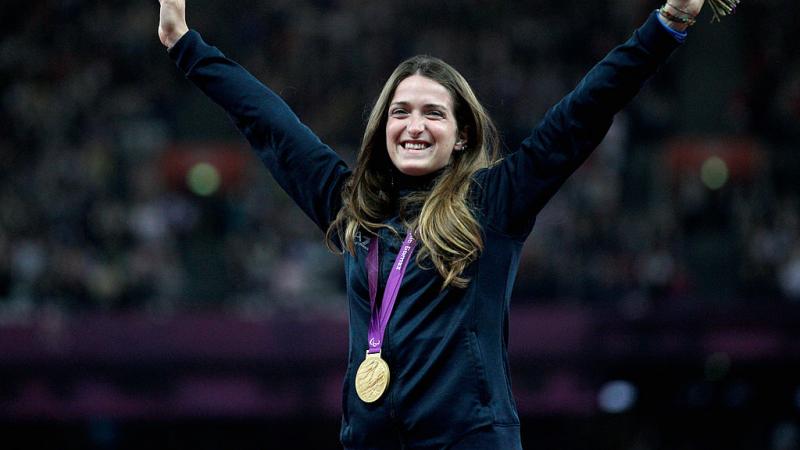 Para sprinter Martini Caironi celebrates her gold medal on the podium 