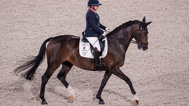 Para equestrian rider Natasha Baker riding a dressage horse