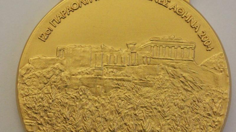 Photo shows the front side of the Athens 2004 gold medal