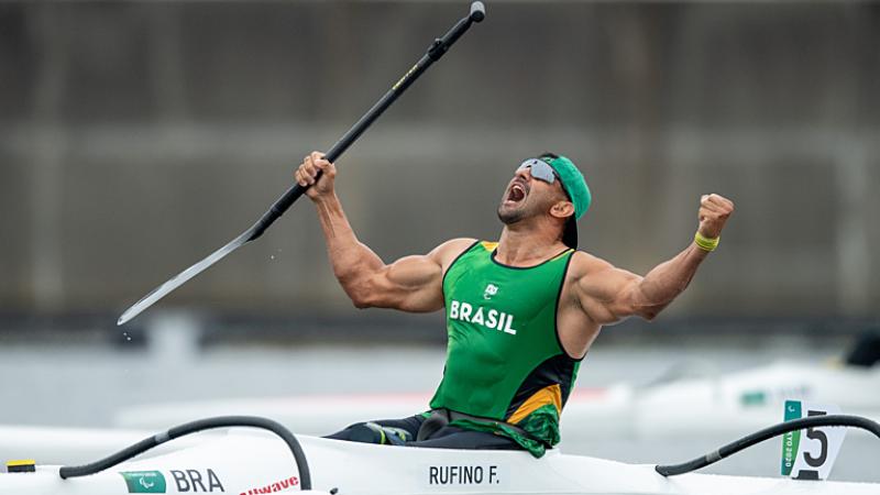 Male Para canoeist Fernando Rufino De Paulo roars in celebration  