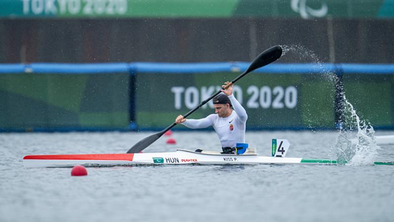 Para canoeist Peter Pal Kiss paddles through the water