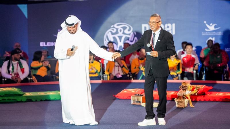 Two men standing on the stage during the Para Powerlifting World Championships in Dubai